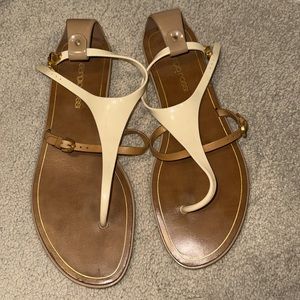 Sergio Rossi t strap thong sandal with gold buckle detail on the sidd